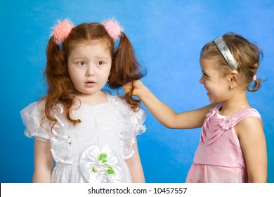 Angry Little Girl Pulling Redhead Girl Her Hair