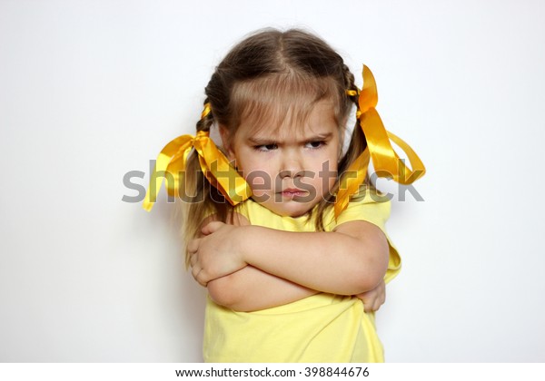 Angry Little Girl Yellow Bows Yellow Stock Photo (Edit Now) 398844676