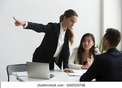 Angry Mad Female HR Representative Pointing At Door, Asking Male Job Candidate To Leave, Making Verbal Sign. Applicant Show No Respect, Ignoring Requests. Dismissal, Bad Interview, Annoyed Employers.