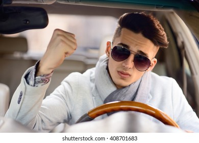 Angry Man Driving A Car