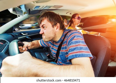 Angry man driving the car