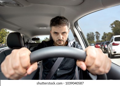 Angry Man Driving A Vehicle