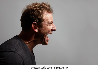 Angry man profile face