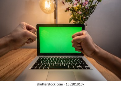 Angry Man Waves His Fists In Front Of A Modern Laptop Computer Green Screen Chroma Keyed First Person View FPV