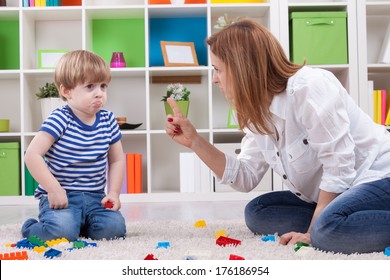 Angry mother scolding a disobedient child - Shutterstock ID 176186954
