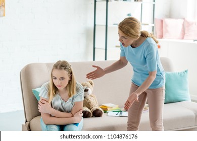 Angry Mother Yelling At Teen Daughter At Home