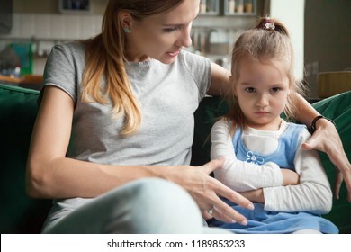 Angry Offended Little Girl Ignoring Not Listening Mother Words, Advice, Mum Hugging, Talking With Stubborn, Upset Daughter At Living Room, Bad Upbringing, Difficult Behavior Of Child