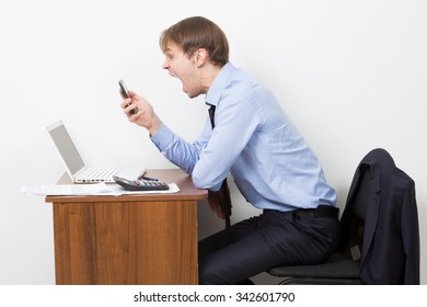 Angry Office Worker Yelling Into The Phone