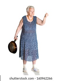 Angry old woman with a pan on a white background