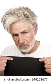 Angry Older Man Being Booked Into Jail With Copy Space/ Mug Shot