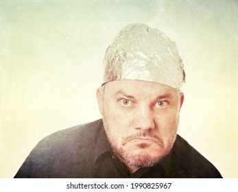 Angry Paranoid Man Wearing Tin Foil Hat