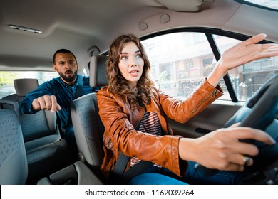 Angry Passenger Arguing With Female Uber Driver, Screaming And Gesturing. 