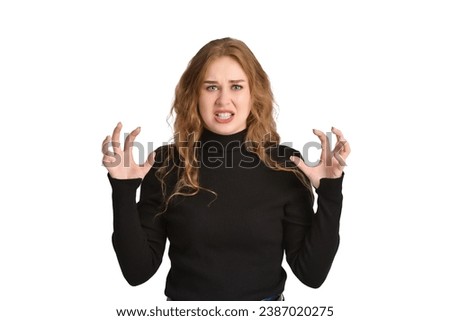 Angry pretty Caucasian blonde woman with splayed fingers. Front view. Studio shot.