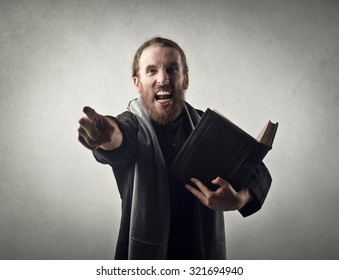 Angry Priest Doing A Sermon