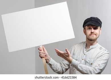 Angry Protesting Worker With Blank Protest Sign.