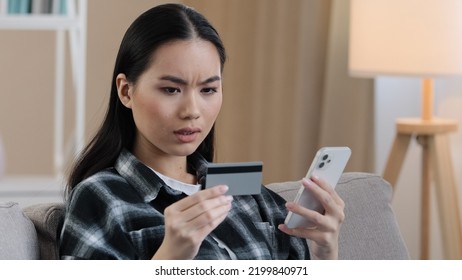 Angry Puzzled Asian Woman Try To Pay With E-bank App Online Service Has Problem With Credit Card Blocked Financial Limit Not Activated For Internet Payment Unsuccessful Transaction With Phone Error