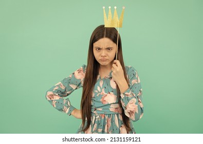 Angry Selfish Girl Hold Booth Crown Over Head Keeping Arm Akimbo Blue Background, Egoist