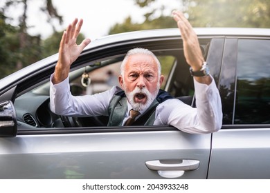 Angry Senior Man  Arguing After Car Accident.