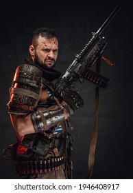 Angry And Serious Male Survivor With Shotgun In Dark Background