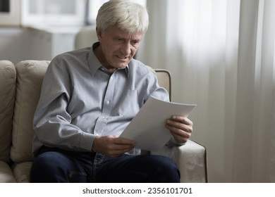 Angry stressed senior man staring at document, reading paper letter, bank notice, medical insurance agreement, feeling mad, frustrated, nervous, worried, finding money loss, mistake, error - Powered by Shutterstock