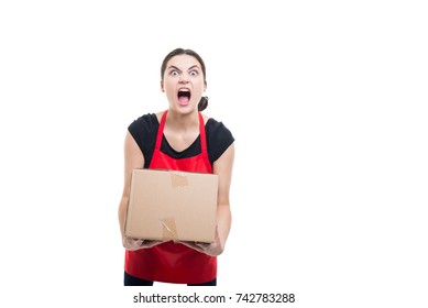 Angry Supermarket Clerk Screaming With Rage While Carrying A Cardboard Box