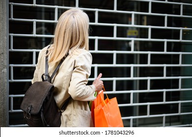 Angry And Surprised Customer In Front Of A Shop Closed Due To Coronavirus Pandemic