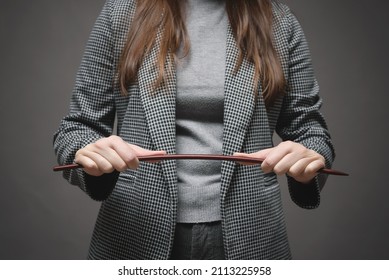 Angry Teacher Is Bending A School Pointer Stick Close Up.