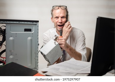 Angry Tired Man With Computer Power Unit Calls To Technical Support