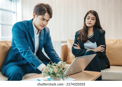 Angry And Unhappy India  Businesswoman Arguing With Businessman About Work Failure At Office, Executives Having Conflict Over Responsibility For Bad Work Results In Office With Man  In Foreground.