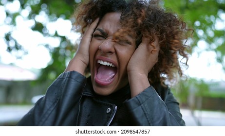 Angry Upset Black Woman Yelling And Screaming In Frustration