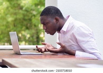 Angry, Upset, Frustrated African Man, Concept Of Poor Internet Connection, Internet Scam, Job Problem, Pay Cut