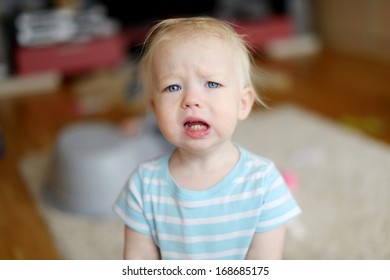 Angry Upset Toddler Girl At Home