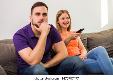 Angry Wife And Husband Are Having Conflict Because Wife Is Watching Tv Too Much.