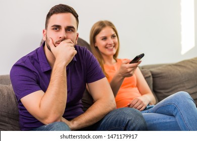 Angry Wife And Husband Are Having Conflict Because Wife Is Watching Tv Too Much.