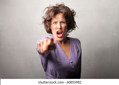 Angry woman accusing someone