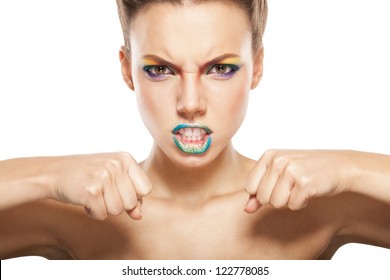 Angry Woman, Beautiful Female Face With Rainbow Makeup.