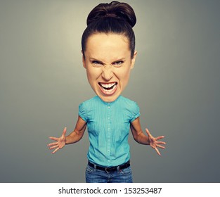 Angry Woman With Big Head Over Grey Background