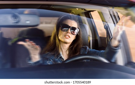 
Angry woman in the car