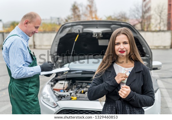Angry woman\
with euro going to pay for\
maintenance