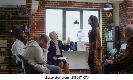 Angry Woman Explaining Anger Management Problems At Aa Group Meeting With Psychiatrist. Desperate Adult Dealing With Mental Health Issues, Attending Rehabilitation Therapy Session.