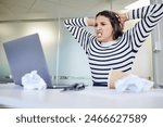 Angry, woman and frustrated at computer with stress from online glitch, mistake or internet problem. Mad, person or anger for error, email and laptop connection fail or delete work on accident