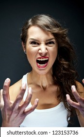 Angry Woman On Black Background