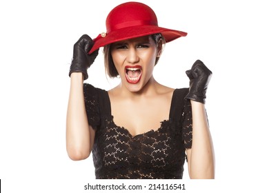Angry Woman With A Red Hat And Leather Gloves On White Background
