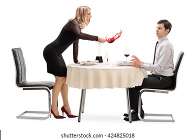 Angry Woman Spilling Her Drink On A Man And Yelling At Him On A Restaurant Table Isolated On White Background