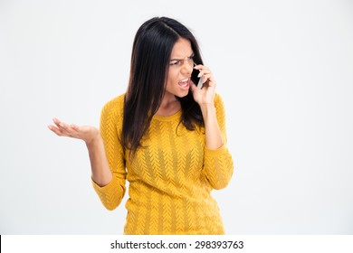 Angry Woman Talking On The Phone Isolated On A White Background