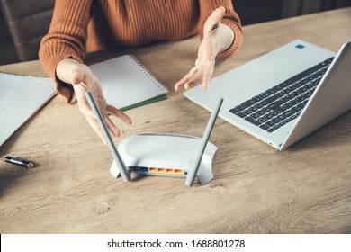 Angry Woman With Wifi Router  In Office Background