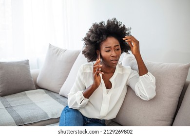 Angry Young African Woman Looking At Smartphone, Frustrated With No Signal Or Message Of Deception, Crazy Woman Disappointed Reading Bad News On Phone, Upset Girl Gets Negative Answer Or Rejected 