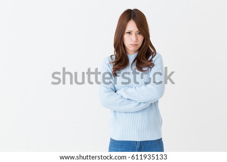 Angry young attractive asian woman