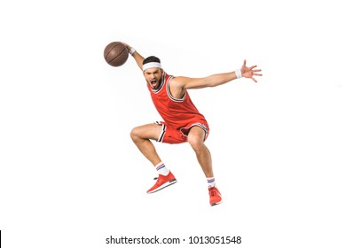 angry young basketball player playing with ball isolated on white - Shutterstock ID 1013051548