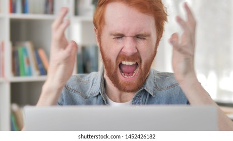 Angry Young Casual Redhead Man Screaming at Work